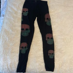 Black leggings with skulls size small, very soft